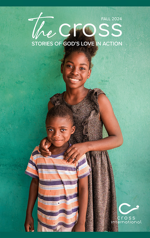 Magazine cover featuring siblings from the Haitian immigrant community in the sugar cane fields, posing together for the camera.