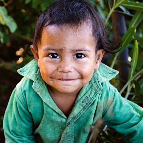 Nicaraguan boy smiling to the camera, grateful for the impact of Cross International